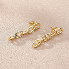 Elegant zirconia chain earrings in gold