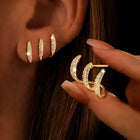 Gold Plated Prong Curved Earrings Featuring Sparkling Earrings