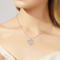 Sterling silver necklace with paw and heart with cubic zirconia