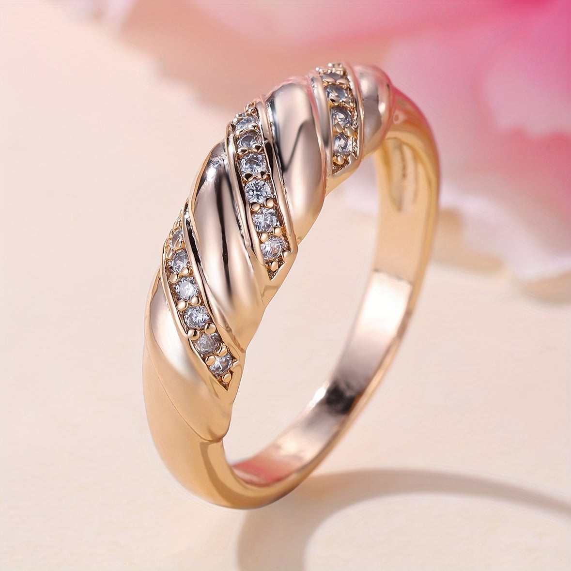 Elegant Zirconia Inlaid Twisted Design Gold Plated Ring