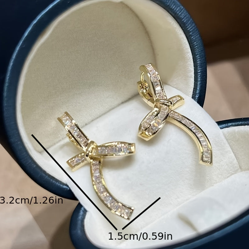 Elegant Baguette Diamond Ribbon Drop Earrings