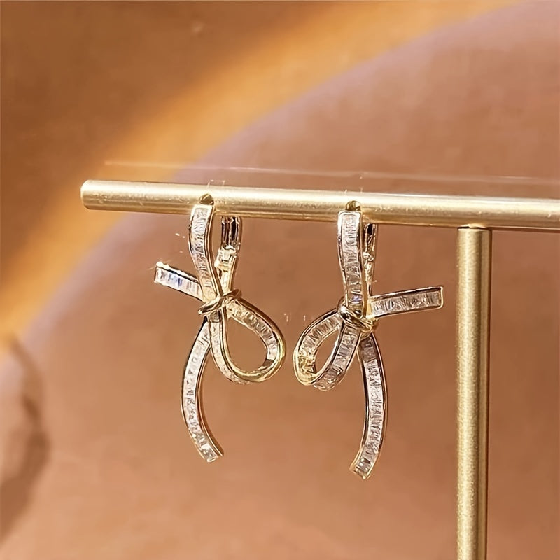 Elegant Baguette Diamond Ribbon Drop Earrings