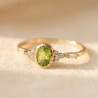 Elodie Oval Peridot and Baguette Diamond Ring in Yellow Gold