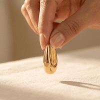 Elegant Gold Polished Teardrop Hoop Earrings